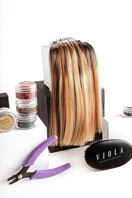 Hair extension colour ring set with tools on a white background, featuring the brand 'Viola'.